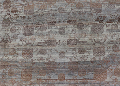 Modern Hand - Knotted Khotan Rug with Sub - Geometric Pomegranate Design This modern casual tribal rug has been hand - knotted. The rug features a modern sub - geometric pomegranate design and is enclosed within a complementary, multi - tiered border, re... - Keivan Woven ArtsAFG - 39680 - 19826Rug