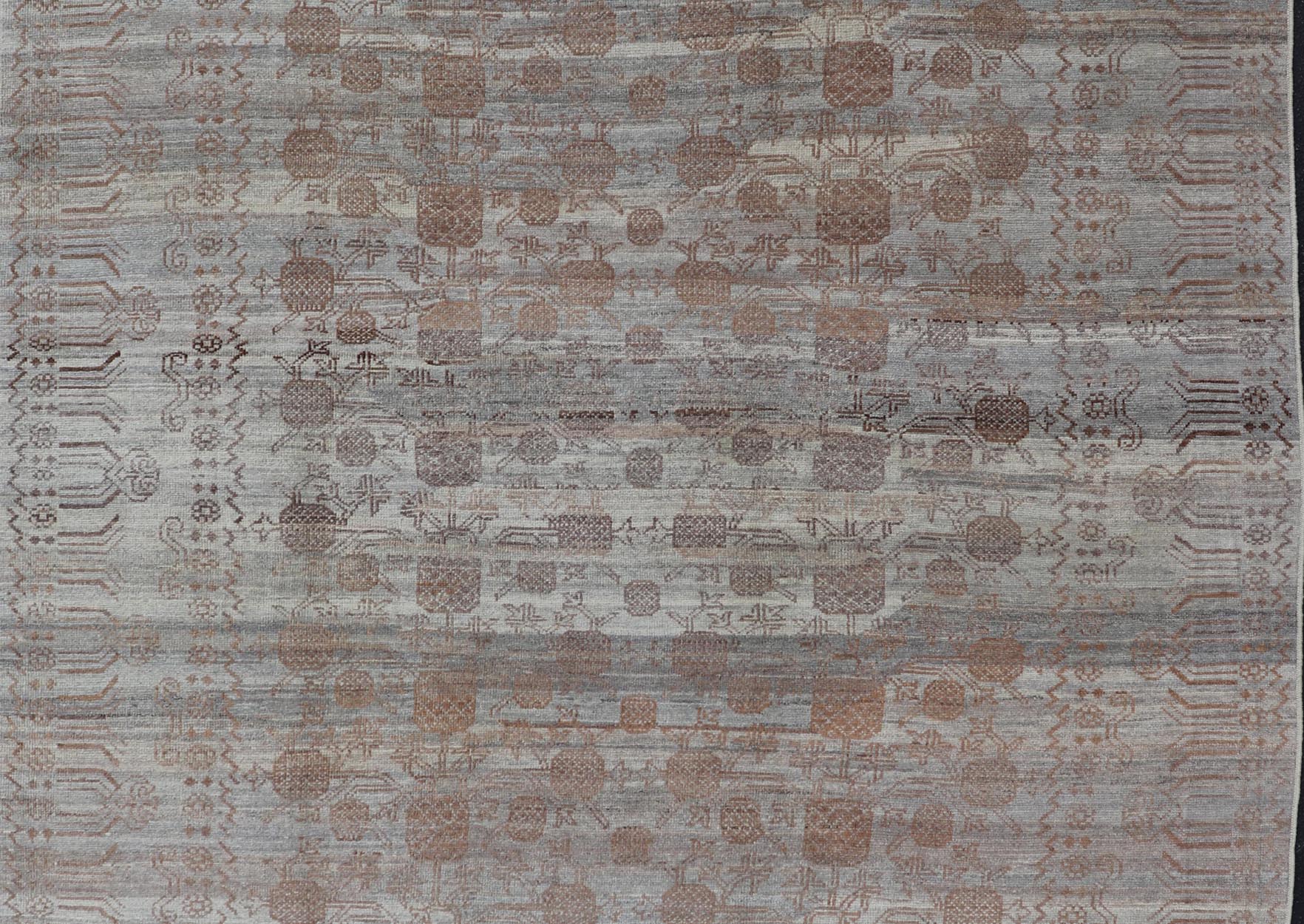 Modern Hand - Knotted Khotan Rug with Sub - Geometric Pomegranate Design This modern casual tribal rug has been hand - knotted. The rug features a modern sub - geometric pomegranate design and is enclosed within a complementary, multi - tiered border, re... - Keivan Woven ArtsAFG - 39680 - 19826Rug