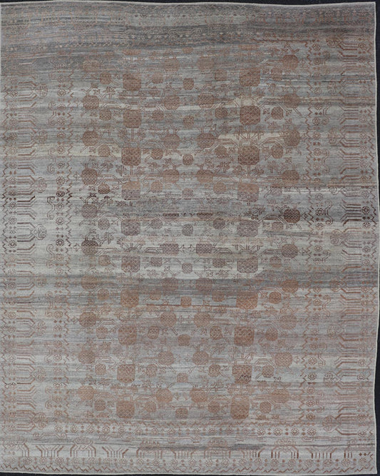 Modern Hand - Knotted Khotan Rug with Sub - Geometric Pomegranate Design This modern casual tribal rug has been hand - knotted. The rug features a modern sub - geometric pomegranate design and is enclosed within a complementary, multi - tiered border, re... - Keivan Woven ArtsAFG - 39680 - 19826Rug