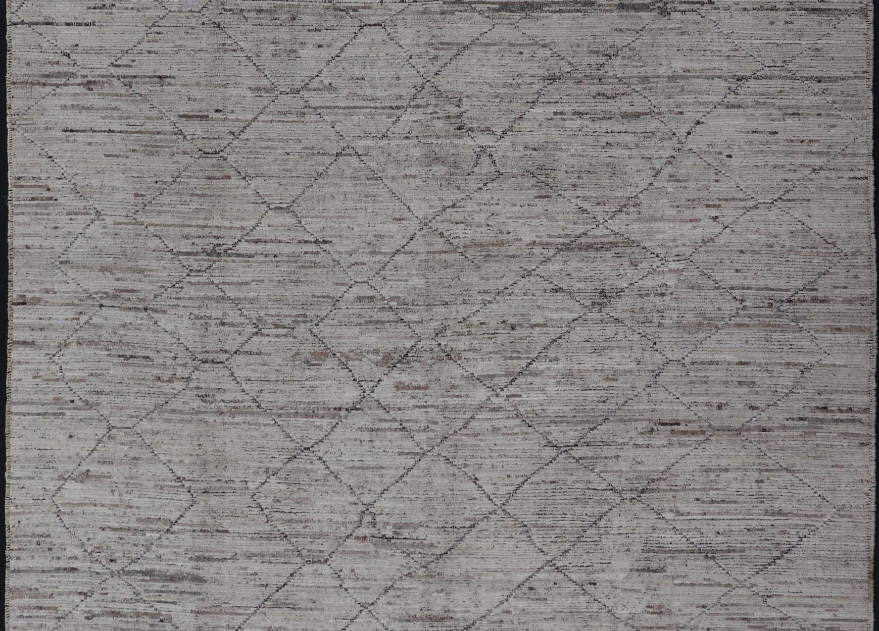 Modern Hand - Knotted Tribal Rug in Wool with Sub - Geometric Diamond Design This modern casual tribal rug has been hand - knotted. The rug features a modern all - over sub - geometric diamond design, rendered in earthy tones, making this rug a superb fi... - Keivan Woven ArtsAFG - 39705 - 19328Rug