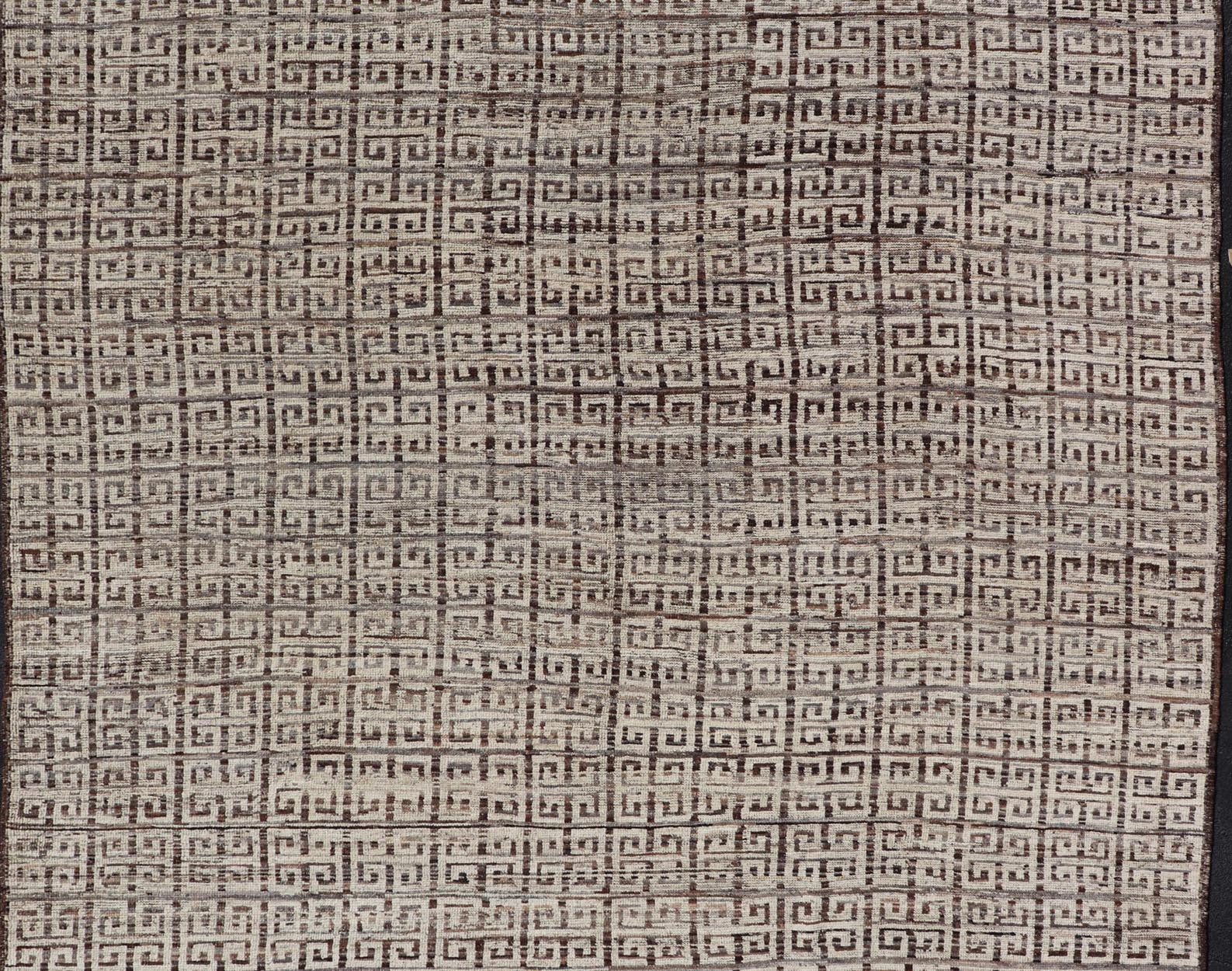 Modern Hand - Knotted Khotan in Wool with Greek Key Design in Earthy Tones This modern casual rug has been hand - knotted. The rug features a modern all - over geometric Greek key design, rendered in earthy tones; making this rug a superb fit for a v... - Keivan Woven ArtsAFG - 39755 - 19346Rug