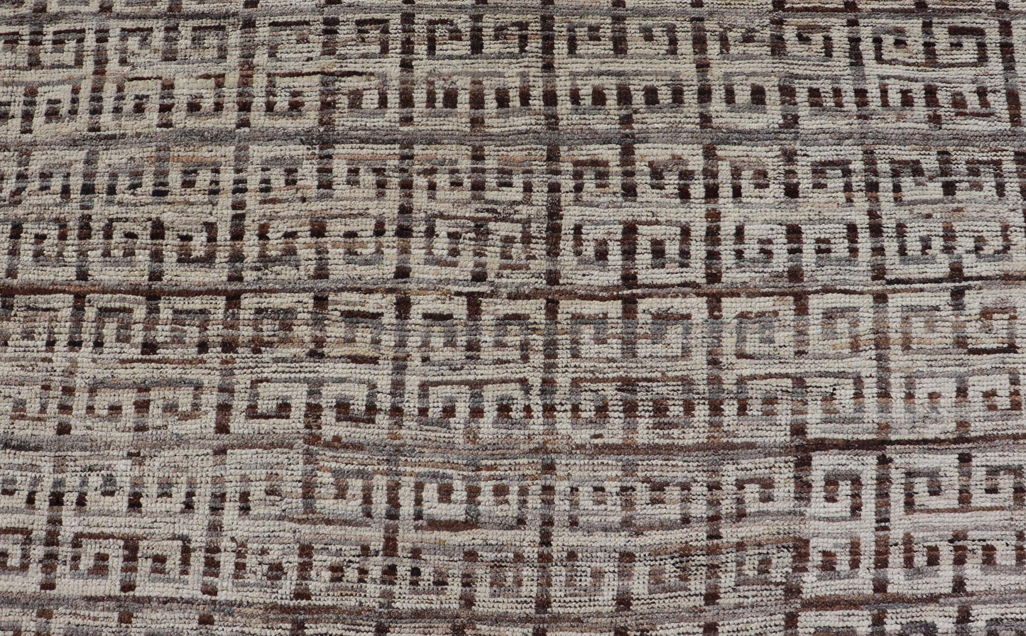 Modern Hand - Knotted Khotan in Wool with Greek Key Design in Earthy Tones This modern casual rug has been hand - knotted. The rug features a modern all - over geometric Greek key design, rendered in earthy tones; making this rug a superb fit for a v... - Keivan Woven ArtsAFG - 39755 - 19346Rug
