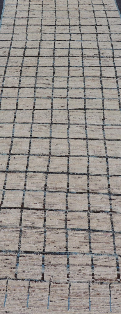 Modern Afghan Hand - Knotted Runner in Wool with All - Over Sub - Geometric Design This modern casual tribal rug has been hand - knotted. The rug features a modern geometric box design, rendered in blue and earthy tones; making this rug a superb fit fo... - Keivan Woven ArtsAFG - 39806 - 17316Rug