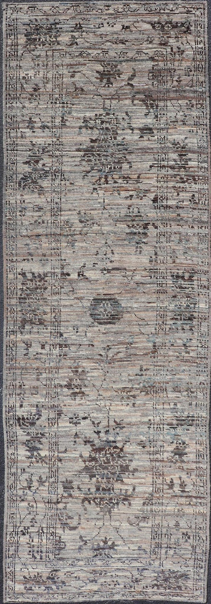 Modern Oushak Designed Runner in Wool with Floral Design in Earthy Tones This modern casual tribal runner has been hand - knotted in wool. The runner features a modern sub - geometric floral design, and is enclosed within a complementary, multi - tie... - Keivan Woven ArtsAFG - 39879 - 19568Rug