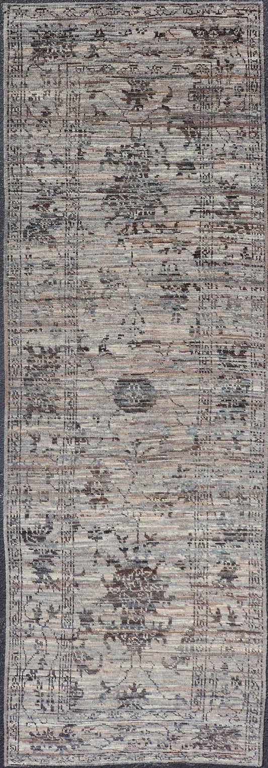 Modern Oushak Designed Runner in Wool with Floral Design in Earthy Tones This modern casual tribal runner has been hand - knotted in wool. The runner features a modern sub - geometric floral design, and is enclosed within a complementary, multi - tie... - Keivan Woven ArtsAFG - 39879 - 19568Rug