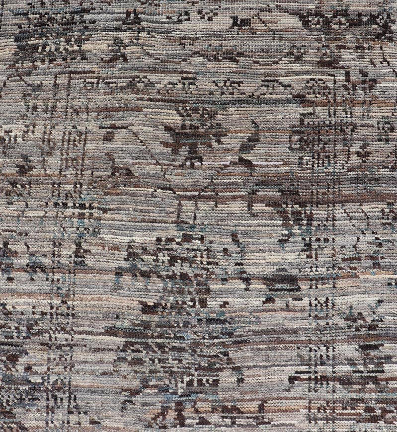 Modern Oushak Designed Runner in Wool with Floral Design in Earthy Tones This modern casual tribal runner has been hand - knotted in wool. The runner features a modern sub - geometric floral design, and is enclosed within a complementary, multi - tie... - Keivan Woven ArtsAFG - 39879 - 19568Rug
