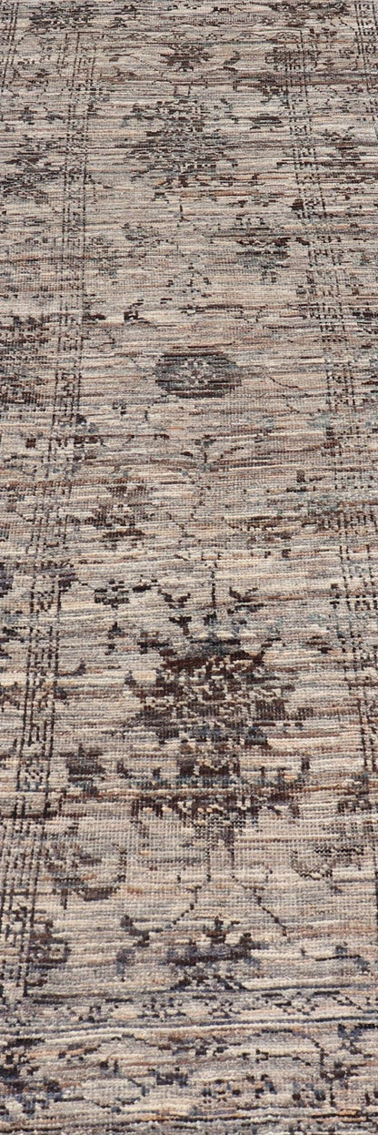 Modern Oushak Designed Runner in Wool with Floral Design in Earthy Tones This modern casual tribal runner has been hand - knotted in wool. The runner features a modern sub - geometric floral design, and is enclosed within a complementary, multi - tie... - Keivan Woven ArtsAFG - 39879 - 19568Rug