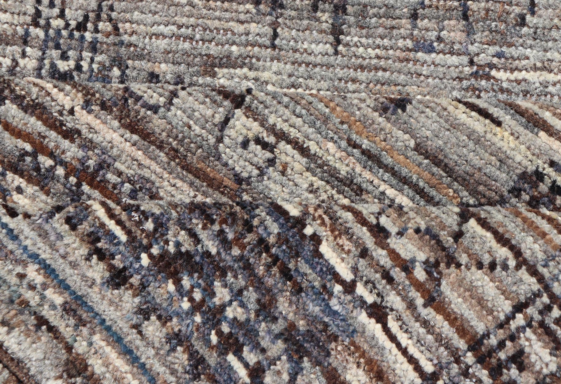 Modern Hand - Knotted Oushak Designed Runner in Wool with Sub - Geometric Design This modern casual tribal runner has been hand - knotted in wool. The runner features a modern sub - geometric oushak design, rendered in charcoal and earthy tones; making ... - Keivan Woven ArtsAFG - 39888 - 19574Rug