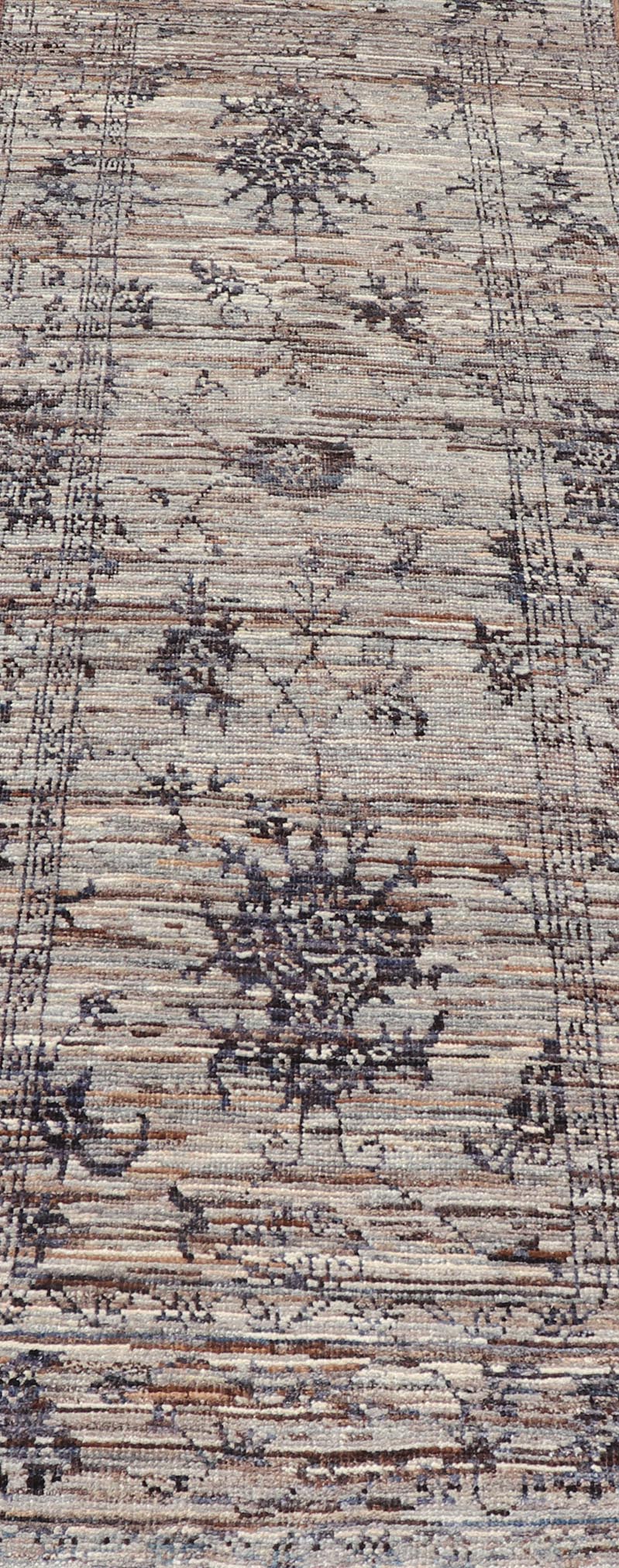 Modern Hand - Knotted Oushak Designed Runner in Wool with Sub - Geometric Design This modern casual tribal runner has been hand - knotted in wool. The runner features a modern sub - geometric oushak design, rendered in charcoal and earthy tones; making ... - Keivan Woven ArtsAFG - 39888 - 19574Rug