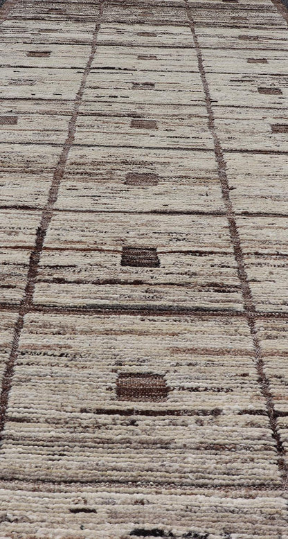 Modern Hand - Knotted Runner in Wool with Box Design in Brown and Neutral Tones This modern casual tribal rug has been hand - knotted in wool. The rug features a modern sub - geometric box design, rendered in brown and neutral tones; making this rug ... - Keivan Woven ArtsAFG - 39892 - 19580Rug