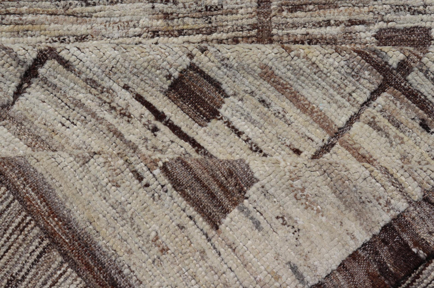 Modern Hand - Knotted Runner in Wool with Box Design in Brown and Neutral Tones This modern casual tribal rug has been hand - knotted in wool. The rug features a modern sub - geometric box design, rendered in brown and neutral tones; making this rug ... - Keivan Woven ArtsAFG - 39892 - 19580Rug
