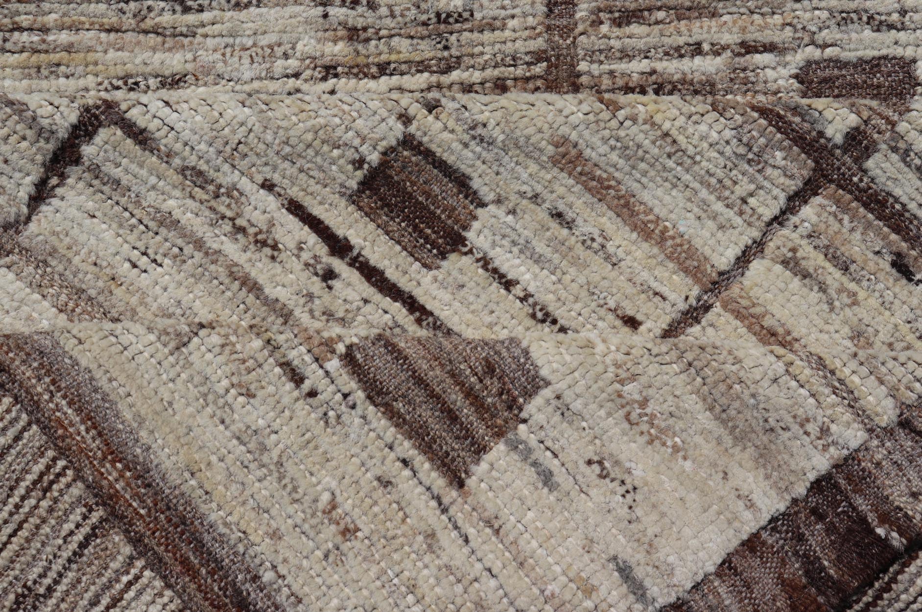 Modern Hand - Knotted Runner in Wool with Box Design in Brown and Neutral Tones This modern casual tribal rug has been hand - knotted in wool. The rug features a modern sub - geometric box design, rendered in brown and neutral tones; making this rug ... - Keivan Woven ArtsAFG - 39892 - 19580Rug