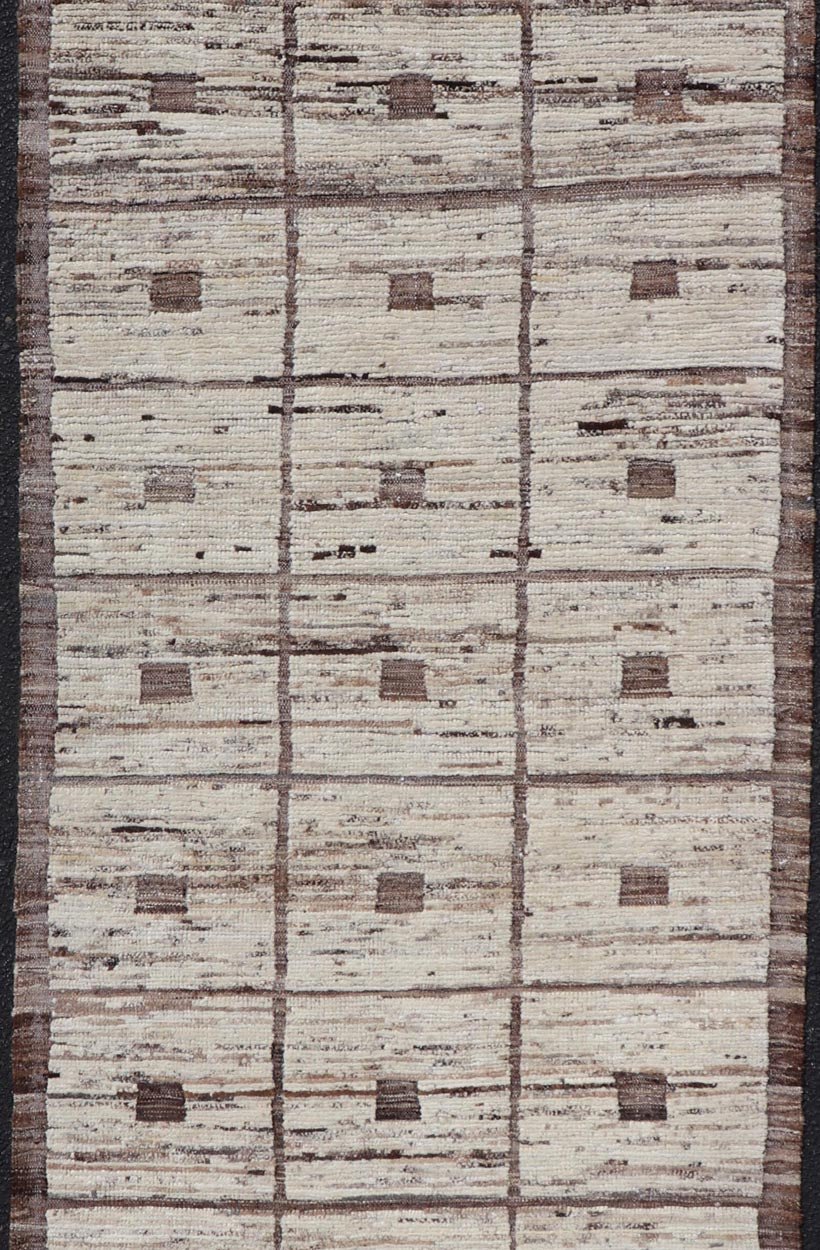 Modern Hand - Knotted Runner in Wool with Box Design in Brown and Neutral Tones This modern casual tribal rug has been hand - knotted in wool. The rug features a modern sub - geometric box design, rendered in brown and neutral tones; making this rug ... - Keivan Woven ArtsAFG - 39892 - 19580Rug