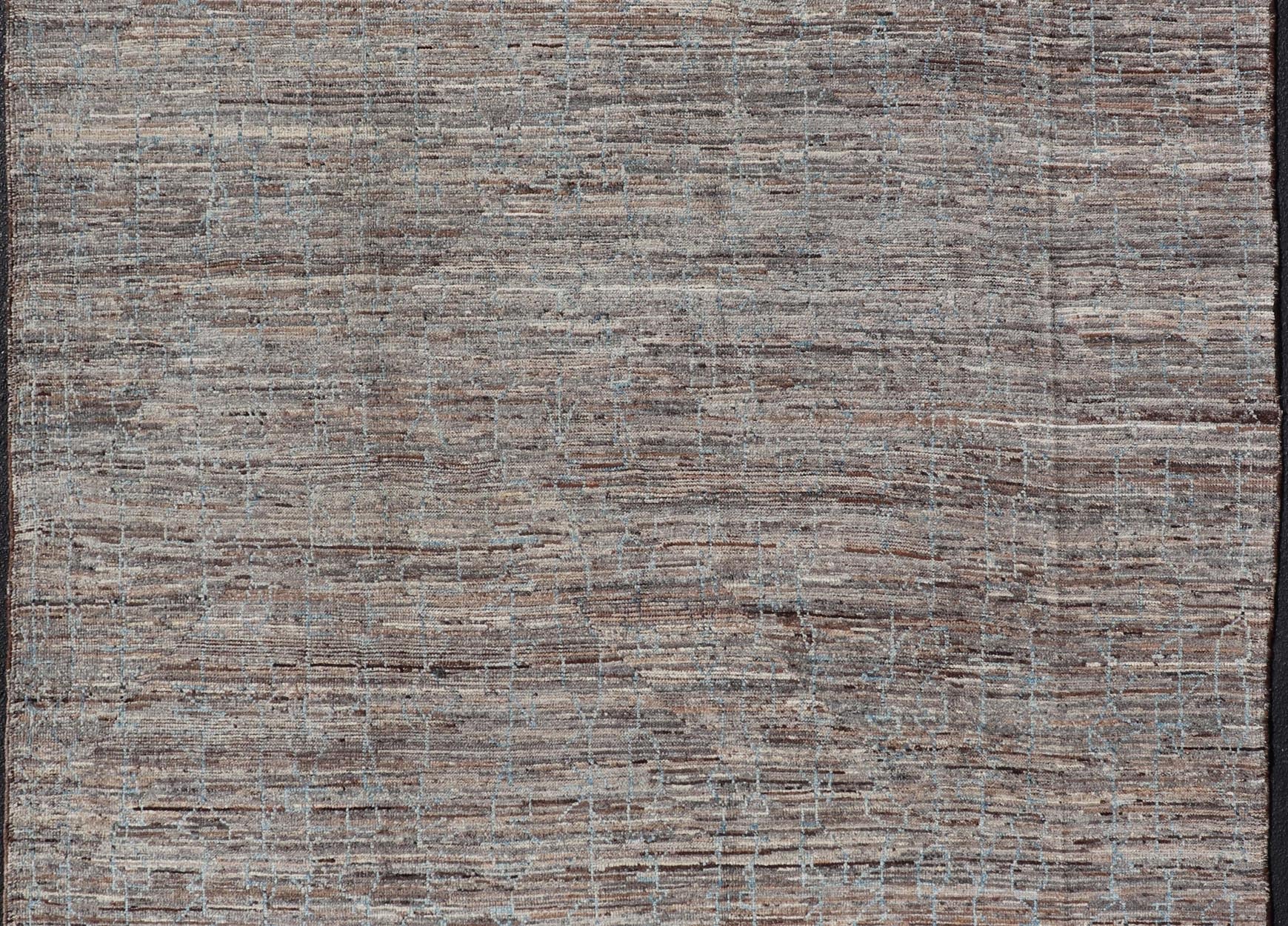 Modern Hand - Knotted Tribal Rug in Wool with All - Over Sub - Geometric Design This modern casual tribal rug has been hand - knotted in wool. The rug features an all - over modern sub - geometric design, rendered in blue, gray and earthy tones; making thi... - Keivan Woven ArtsAFG - 39910 - 19586Rug