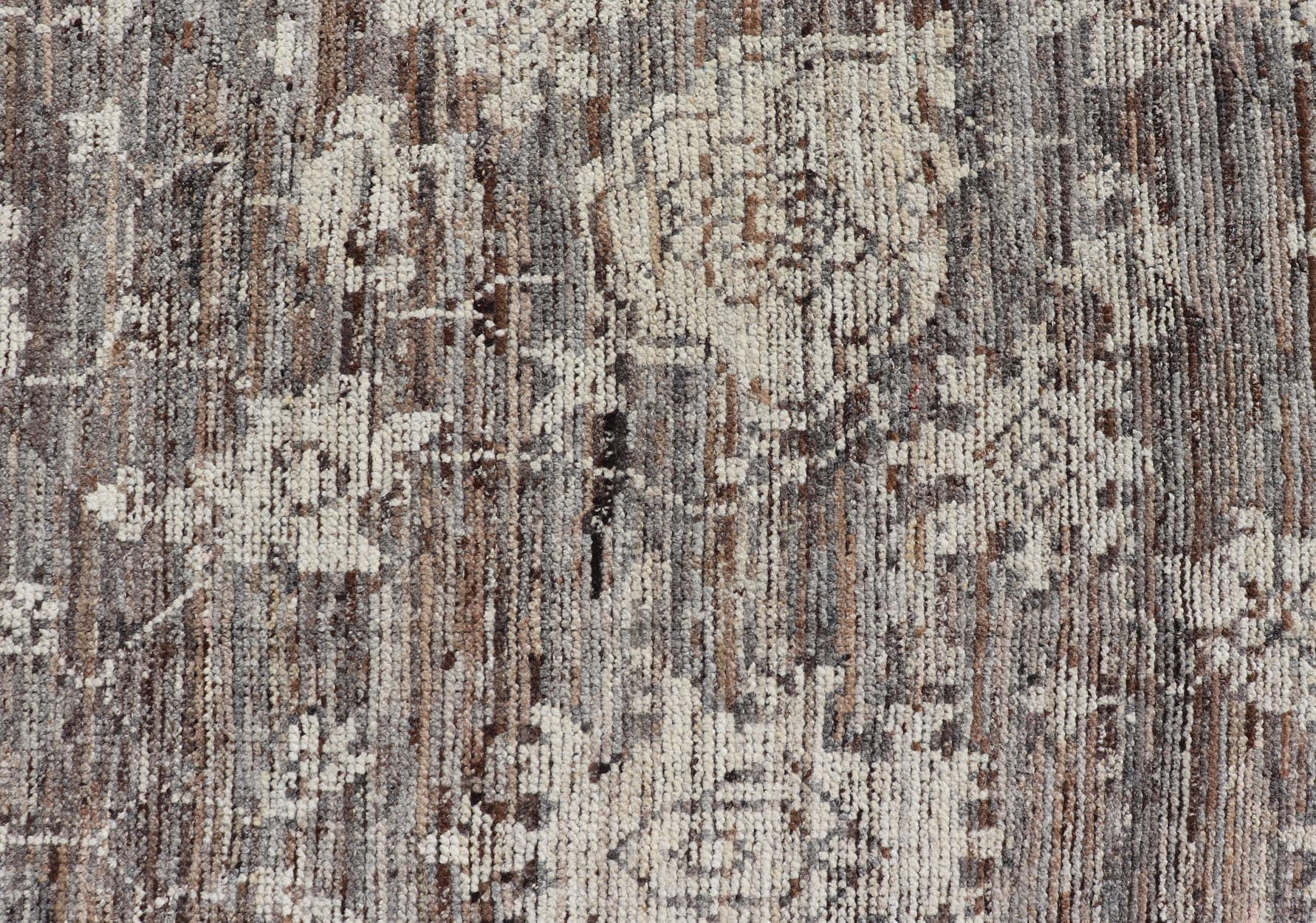 This modern tribal Oushak designed rug has been hand - knotted in wool. The rug features a modern sub - geometric floral design which is enclosed within a complementary, multi - tiered border. The rug is rendered in brown, cream and earthy tones. Measures... - Keivan Woven ArtsAFG - 39912 - 19592Rug