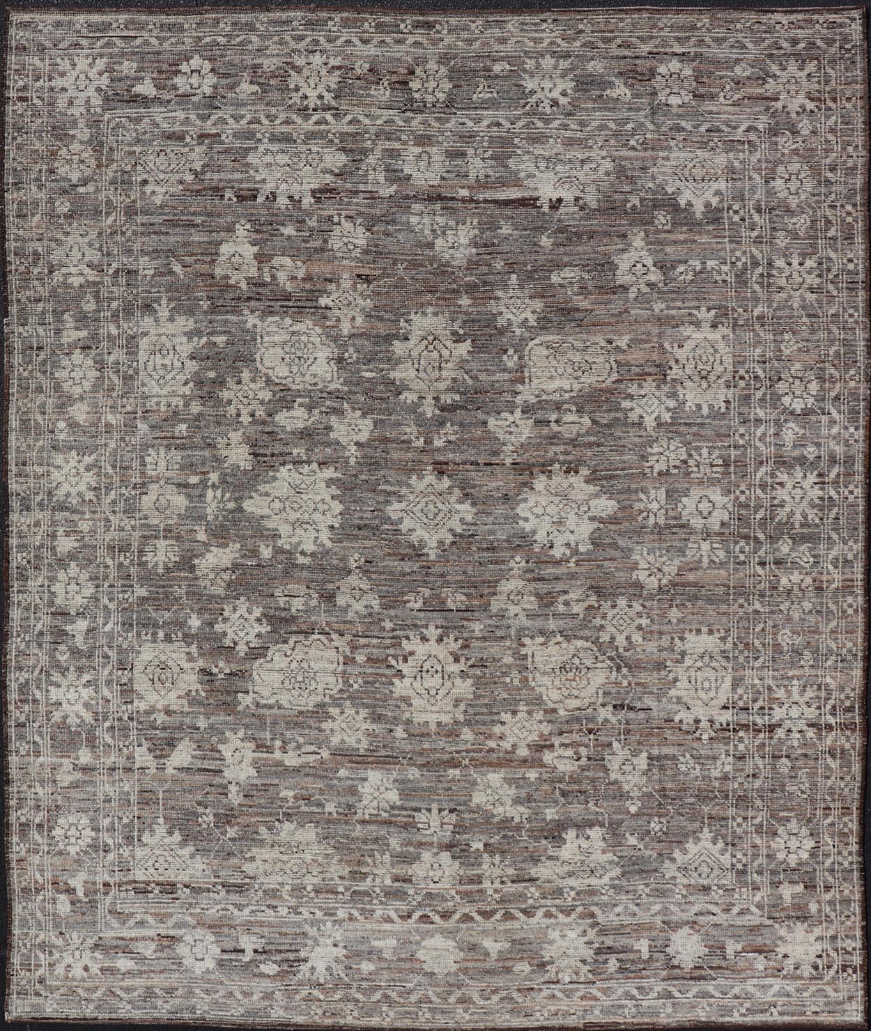 This modern tribal Oushak designed rug has been hand - knotted in wool. The rug features a modern sub - geometric floral design which is enclosed within a complementary, multi - tiered border. The rug is rendered in brown, cream and earthy tones. Measures... - Keivan Woven ArtsAFG - 39912 - 19592Rug