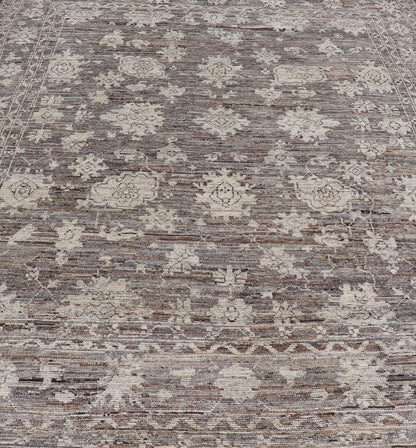 This modern tribal Oushak designed rug has been hand - knotted in wool. The rug features a modern sub - geometric floral design which is enclosed within a complementary, multi - tiered border. The rug is rendered in brown, cream and earthy tones. Measures... - Keivan Woven ArtsAFG - 39912 - 19592Rug