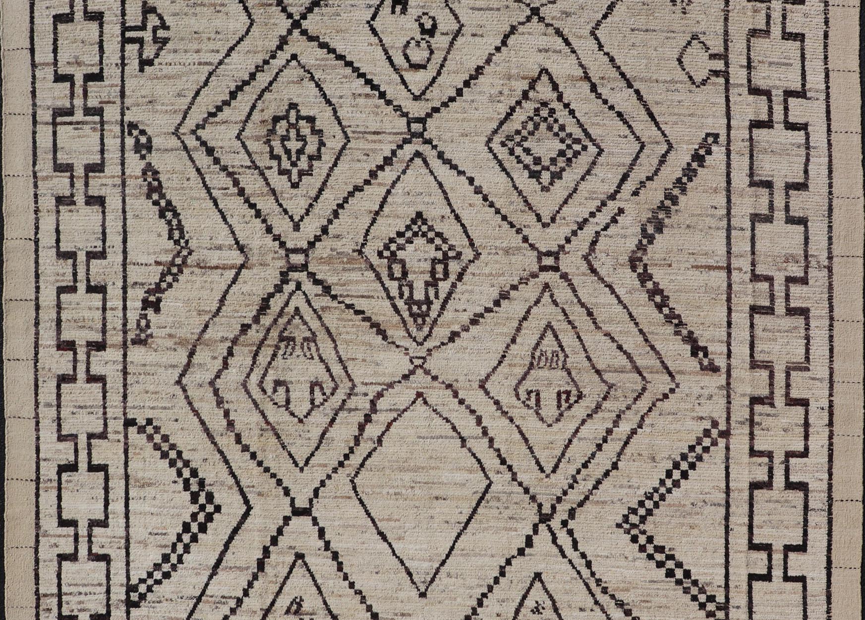 The design of the rug includes a series of interconnected diamond shapes, each containing different motifs such as crosses, zigzags, and other stylized symbols. The central theme is a grid of diamond patterns that vary slightly in size and detail, crea... - Keivan Woven ArtsAFG - 39925 - 19598Rug