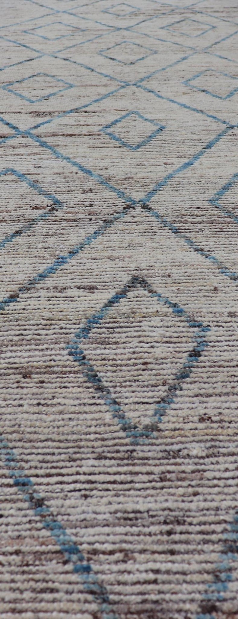 Modern Tribal Runner in Wool with Sub - Geometric Diamond Design in Cream and Blue This modern casual tribal runner has been hand - knotted. The rug features a modern sub - geometric diamond design, rendered in blue and neutral tones, making this rug... - Keivan Woven ArtsAFG - 39935 - 19382Rug