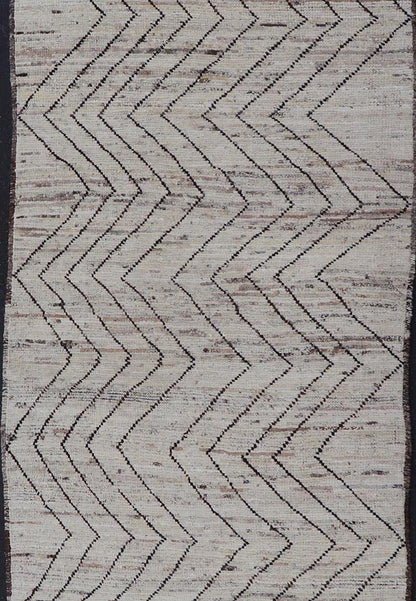Modern Hand - Knotted Runner in Wool with Sub - Geometric Zig - Zag Design This modern casual runner has been hand - knotted. The rug features a modern sub - geometric zig - zag design, rendered in black and earthy tones, making this rug a superb fit for a... - Keivan Woven ArtsAFG - 39950 - 19238Rug