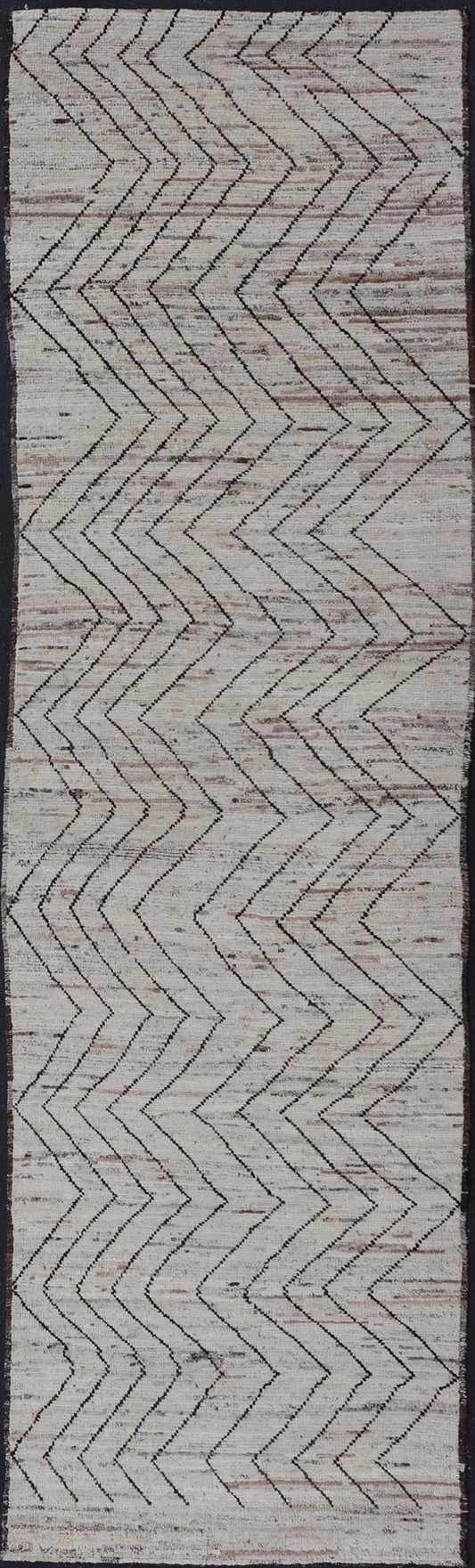 Modern Hand - Knotted Runner in Wool with Sub - Geometric Zig - Zag Design This modern casual runner has been hand - knotted. The rug features a modern sub - geometric zig - zag design, rendered in black and earthy tones, making this rug a superb fit for a... - Keivan Woven ArtsAFG - 39950 - 19238Rug
