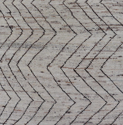 Modern Hand - Knotted Runner in Wool with Sub - Geometric Zig - Zag Design This modern casual runner has been hand - knotted. The rug features a modern sub - geometric zig - zag design, rendered in black and earthy tones, making this rug a superb fit for a... - Keivan Woven ArtsAFG - 39950 - 19238Rug