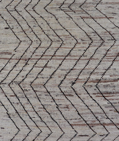 Modern Hand - Knotted Runner in Wool with Sub - Geometric Zig - Zag Design This modern casual runner has been hand - knotted. The rug features a modern sub - geometric zig - zag design, rendered in black and earthy tones, making this rug a superb fit for a... - Keivan Woven ArtsAFG - 39950 - 19238Rug