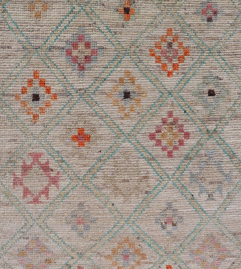 Modern Tulu in Wool with Sub - Geometric Diamond Design in Multicolor This modern casual tribal Tulu runner has been hand - knotted in wool. The rug features a modern sub - geometric diamond design, replete with various motifs in multicolor, making t... - Keivan Woven ArtsAFG - 39977 - 19604Rug