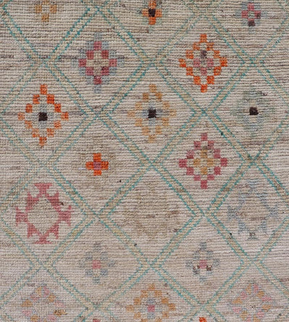 Modern Tulu in Wool with Sub - Geometric Diamond Design in Multicolor This modern casual tribal Tulu runner has been hand - knotted in wool. The rug features a modern sub - geometric diamond design, replete with various motifs in multicolor, making t... - Keivan Woven ArtsAFG - 39977 - 19604Rug