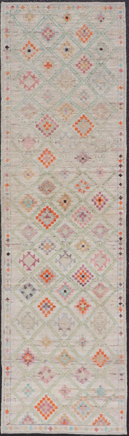Modern Tulu in Wool with Sub - Geometric Diamond Design in Multicolor This modern casual tribal Tulu runner has been hand - knotted in wool. The rug features a modern sub - geometric diamond design, replete with various motifs in multicolor, making t... - Keivan Woven ArtsAFG - 39977 - 19604Rug