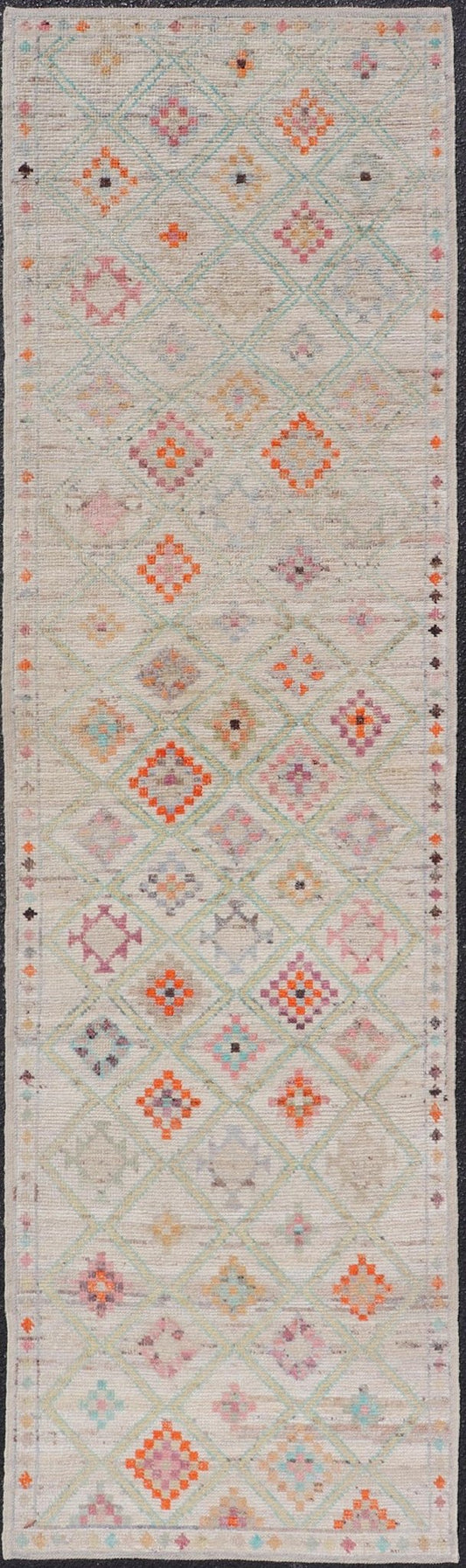 Modern Tulu in Wool with Sub - Geometric Diamond Design in Multicolor This modern casual tribal Tulu runner has been hand - knotted in wool. The rug features a modern sub - geometric diamond design, replete with various motifs in multicolor, making t... - Keivan Woven ArtsAFG - 39977 - 19604