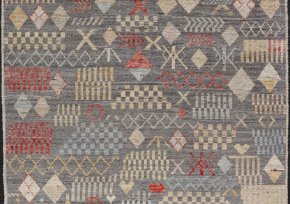 Modern Hand - Knotted Tribal Rug in Wool with Sub - Geometric Design in Multicolor This modern casual tribal rug has been hand - knotted. The rug features a modern all - over sub - geometric design, replete with various motifs in multicolor, making this r... - Keivan Woven ArtsAFG - 39996 - 19400Rug