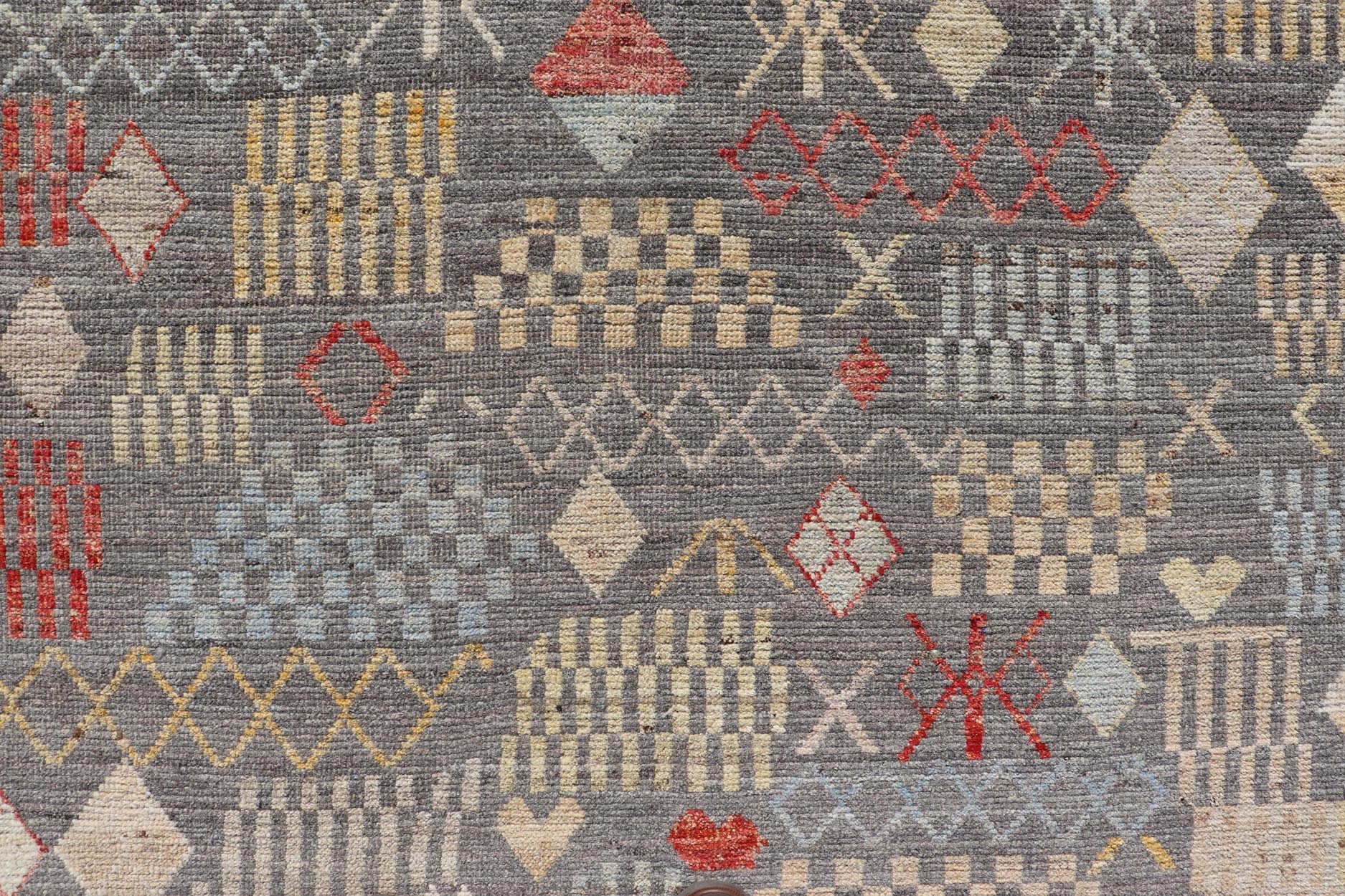 Modern Hand - Knotted Tribal Rug in Wool with Sub - Geometric Design in Multicolor This modern casual tribal rug has been hand - knotted. The rug features a modern all - over sub - geometric design, replete with various motifs in multicolor, making this r... - Keivan Woven ArtsAFG - 39996 - 19400Rug