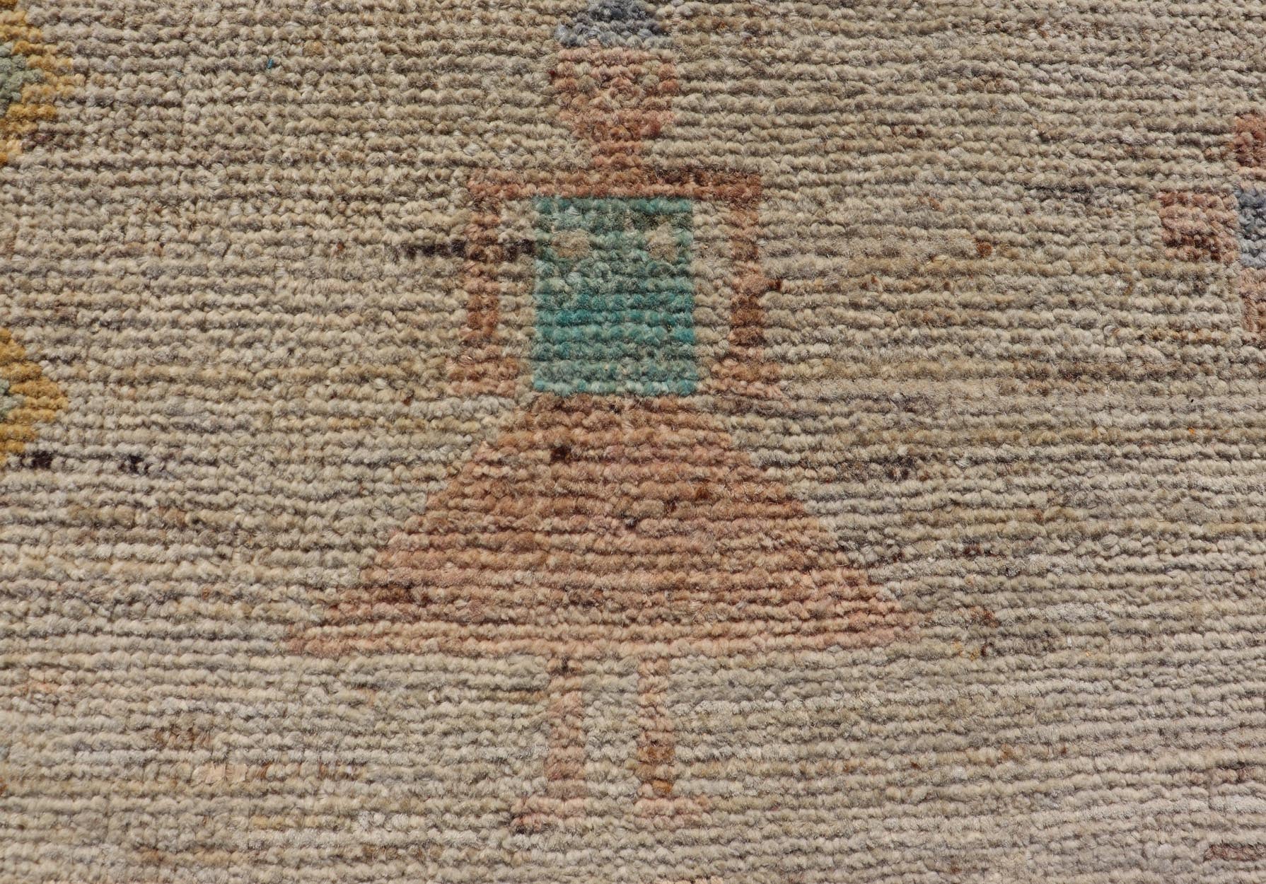 Modern Casual Woolen Tribal Hand - Knotted Rug with Sub - Geometric Design This modern casual tribal rug has been finely hand - knotted using superior wool. The rug features a modern sub - geometric design, replete with various motifs in multicolor, m... - Keivan Woven ArtsAFG - 39998 - 19406Rug