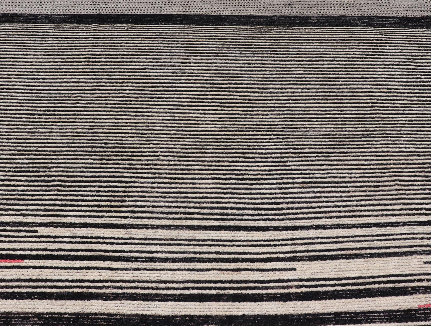 Modern Hand - Knotted Rug in Wool with Abstract Linear Design in Black & Ivory This modern casual tribal rug has been hand - knotted. The rug features a modern sub - geometric abstract linear design, rendered in black and ivory; making this rug a sup... - Keivan Woven ArtsAFG - 40854 - 19436Rug