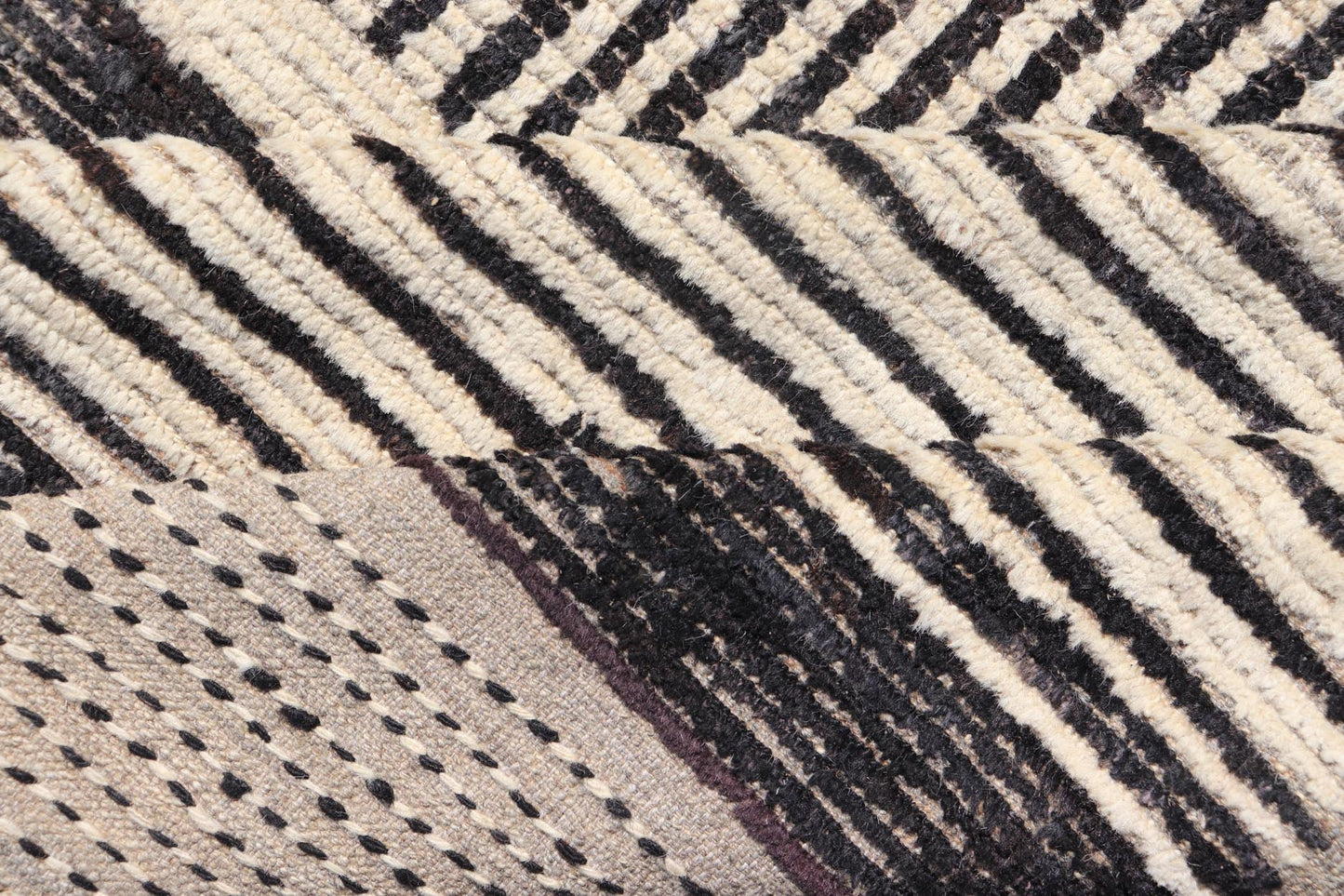 Modern Hand - Knotted Rug in Wool with Abstract Linear Design in Black & Ivory This modern casual tribal rug has been hand - knotted. The rug features a modern sub - geometric abstract linear design, rendered in black and ivory; making this rug a sup... - Keivan Woven ArtsAFG - 40854 - 19436Rug