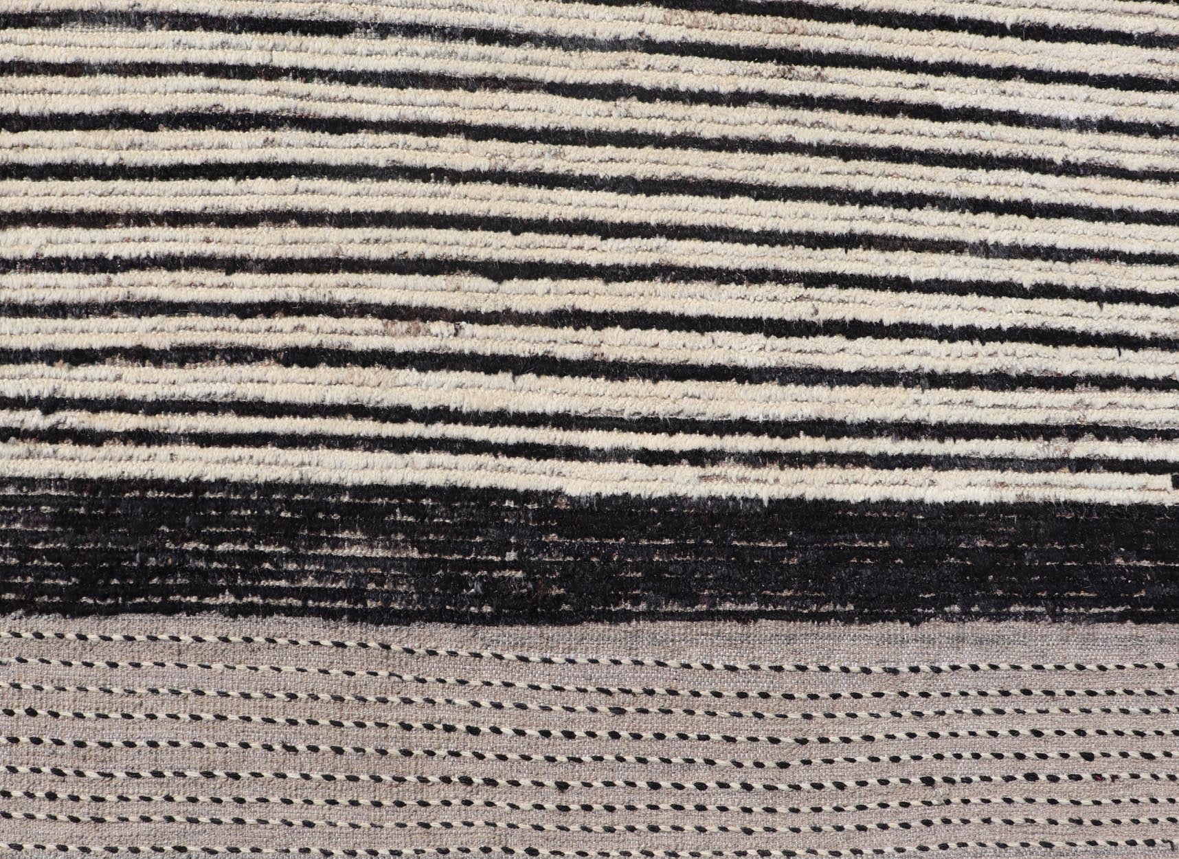 Modern Hand - Knotted Rug in Wool with Abstract Linear Design in Black & Ivory This modern casual tribal rug has been hand - knotted. The rug features a modern sub - geometric abstract linear design, rendered in black and ivory; making this rug a sup... - Keivan Woven ArtsAFG - 40854 - 19436Rug