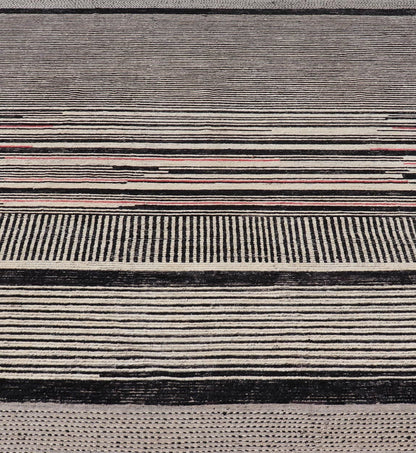 Modern Hand - Knotted Rug in Wool with Abstract Linear Design in Black & Ivory This modern casual tribal rug has been hand - knotted. The rug features a modern sub - geometric abstract linear design, rendered in black and ivory; making this rug a sup... - Keivan Woven ArtsAFG - 40854 - 19436Rug