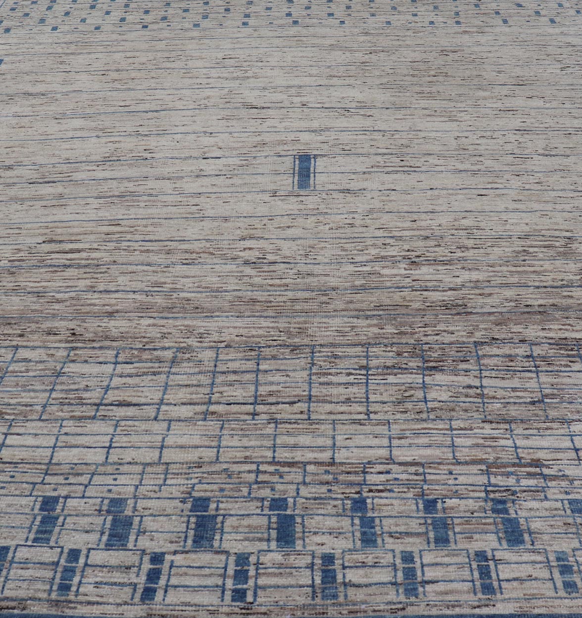 Modern Hand - Knotted Rug in Wool with Sub - Geometric Design in Blue and Cream This modern casual tribal rug has been hand - knotted. The rug features a modern sub - geometric design, rendered in blue and cream; making this rug a superb fit for a var... - Keivan Woven ArtsAFG - 40860 - 19448Rug