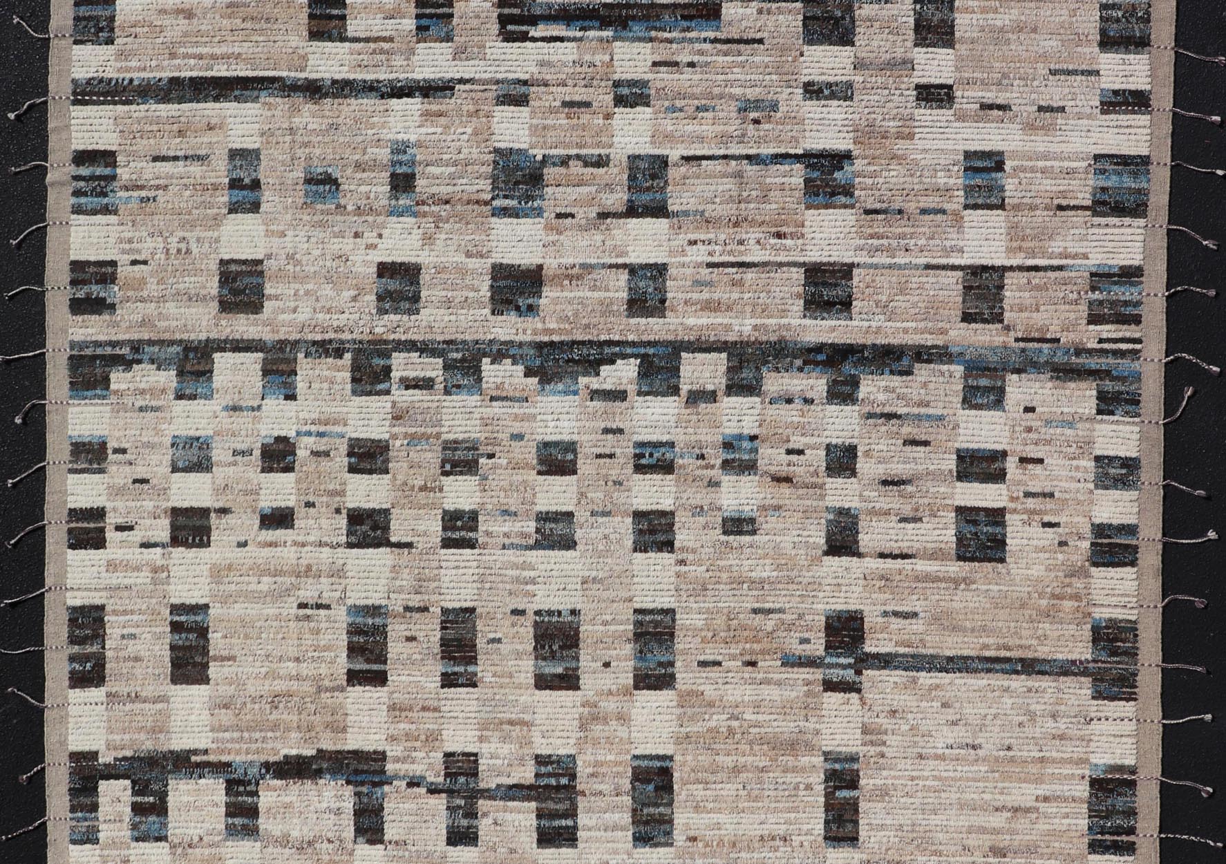 Modern Hand - Knotted Moroccan Rug in Wool with Sub - Geometric Design This modern casual tribal rug has been hand - knotted in wool. The rug features a modern sub - geometric modern design, rendered in blue, charcoal and earthy tones; making this rug a... - Keivan Woven ArtsAFG - 40965 - 19634Rug