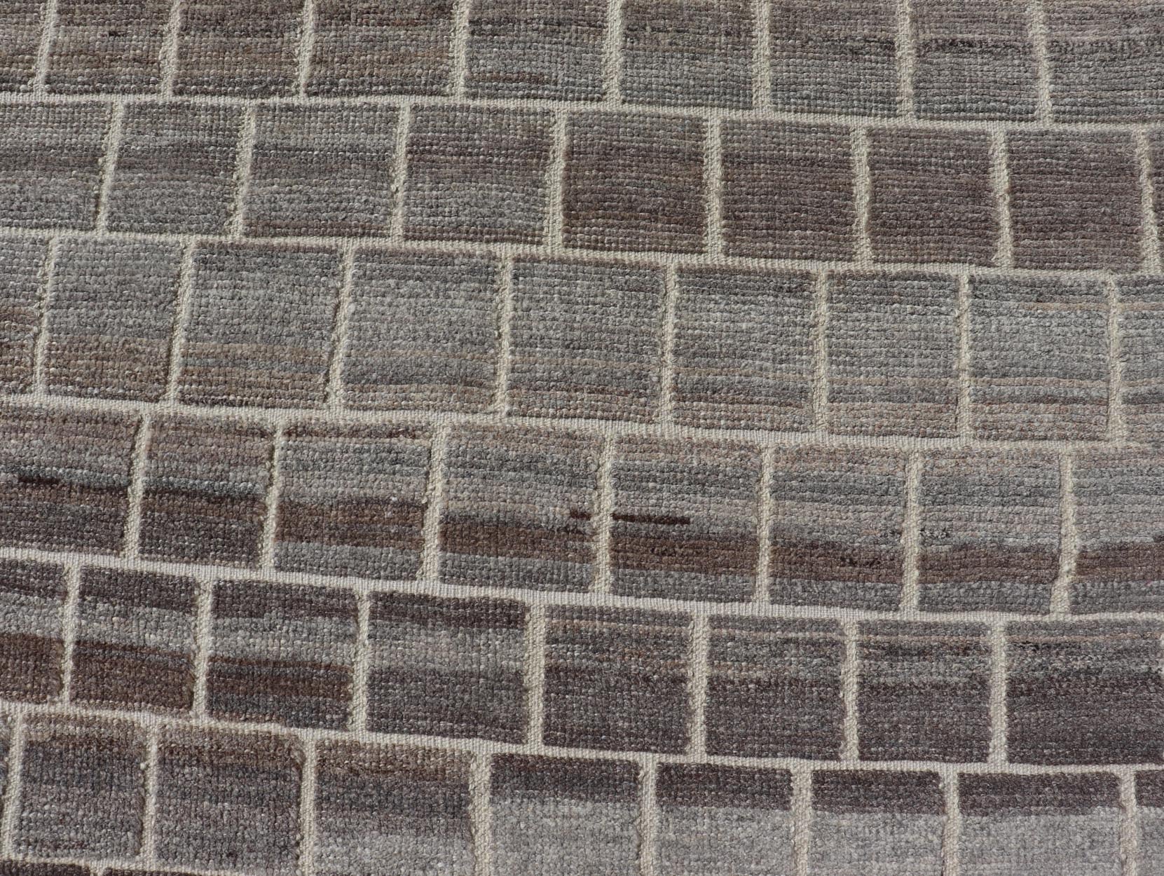 The rug showcases its expansive grid pattern, emphasizing the uniformity and precise alignment of each block. The blocks contrast sharply against the lighter threads, creating a striking visual grid that is both bold and balanced. Perfect for a contemp... - Keivan Woven ArtsAFG - 40986 - 19640Rug