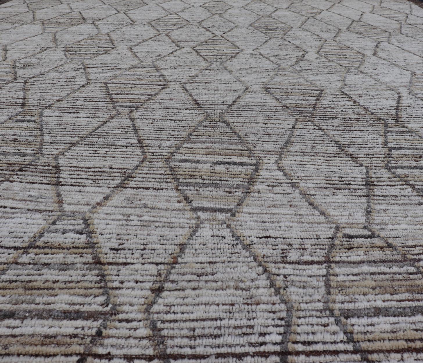 Modern Hand - Knotted Rug in Wool with Sub - Geometric Diamond Design in Earth Tones This modern casual tribal rug has been hand - knotted. The rug features a modern all - over sub - geometric diamond design, rendered in earthy tones, making this rug a s... - Keivan Woven ArtsAFG - 41004 - 19460Rug