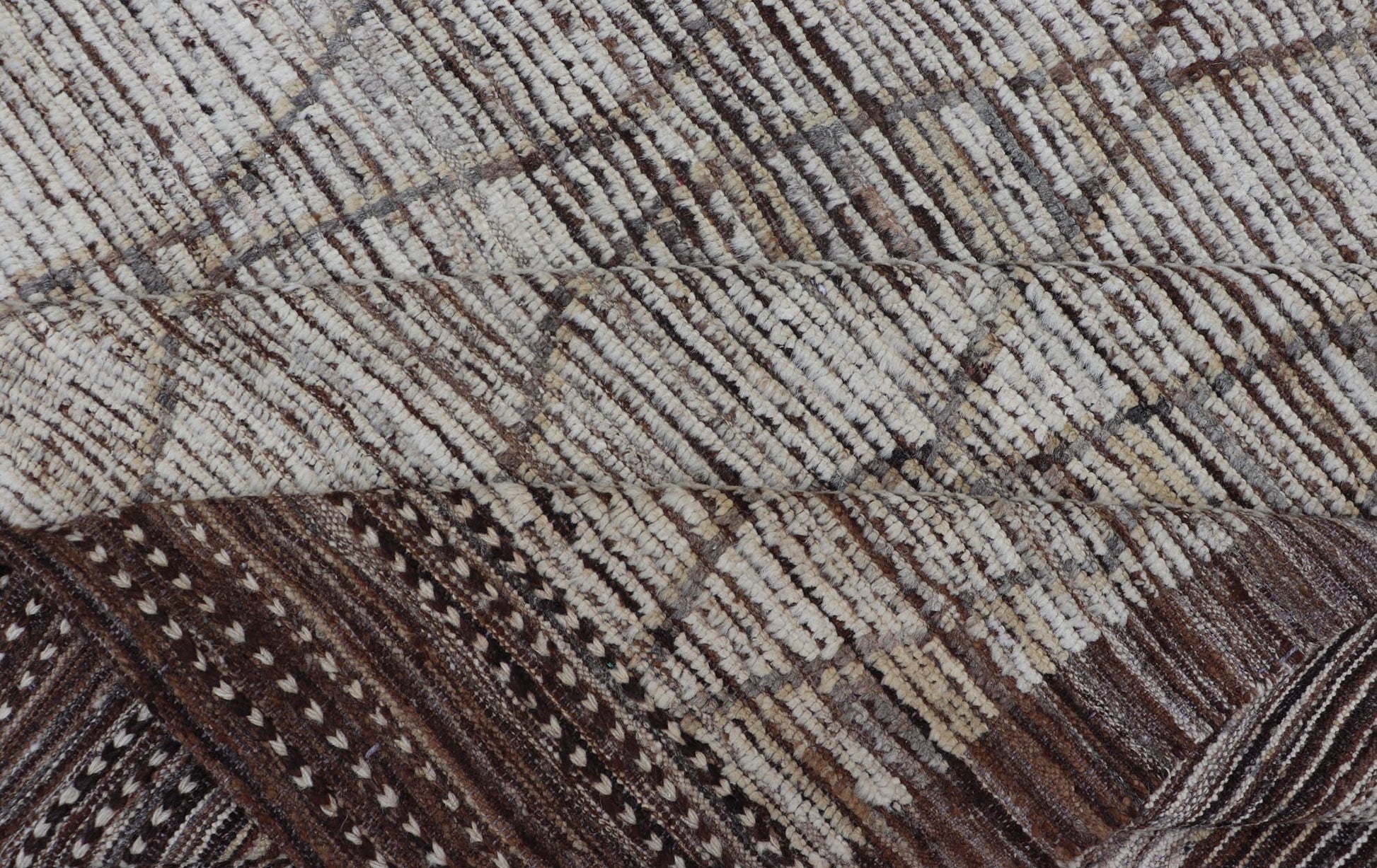 Modern Hand - Knotted Rug in Wool with Sub - Geometric Diamond Design in Earth Tones This modern casual tribal rug has been hand - knotted. The rug features a modern all - over sub - geometric diamond design, rendered in earthy tones, making this rug a s... - Keivan Woven ArtsAFG - 41004 - 19460Rug