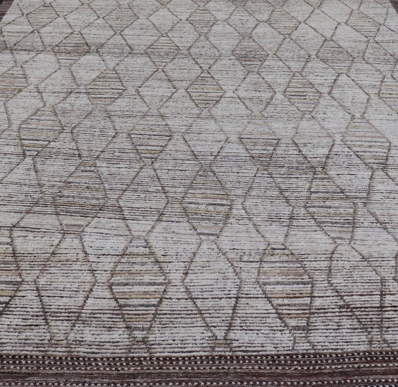 Modern Hand - Knotted Rug in Wool with Sub - Geometric Diamond Design in Earth Tones This modern casual tribal rug has been hand - knotted. The rug features a modern all - over sub - geometric diamond design, rendered in earthy tones, making this rug a s... - Keivan Woven ArtsAFG - 41004 - 19460Rug