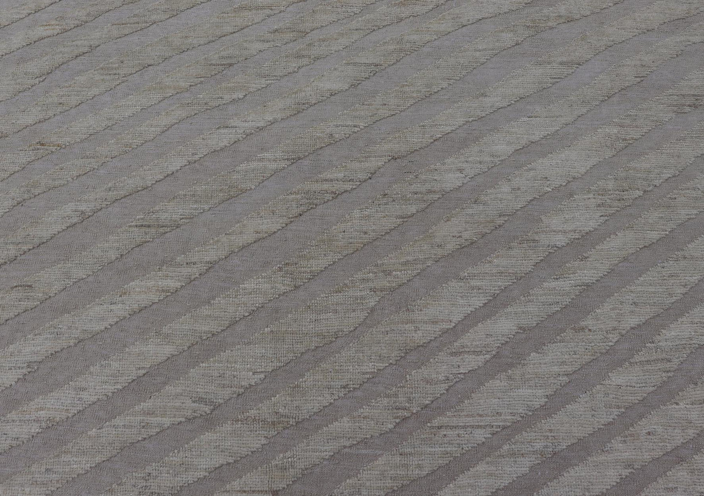 Modern Rug in Wool with Sub - Geometric Slanted Linear Design in Cream and Taupe This modern casual tribal rug has been hand - knotted in wool. The rug features a modern sub - geometric slanted linear design, rendered in creams tones; making this rug ... - Keivan Woven ArtsAFG - 41009 - 19808Rug