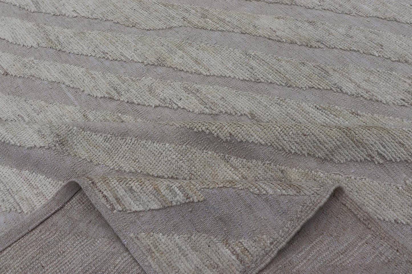 Modern Rug in Wool with Sub - Geometric Slanted Linear Design in Cream and Taupe This modern casual tribal rug has been hand - knotted in wool. The rug features a modern sub - geometric slanted linear design, rendered in creams tones; making this rug ... - Keivan Woven ArtsAFG - 41009 - 19808Rug