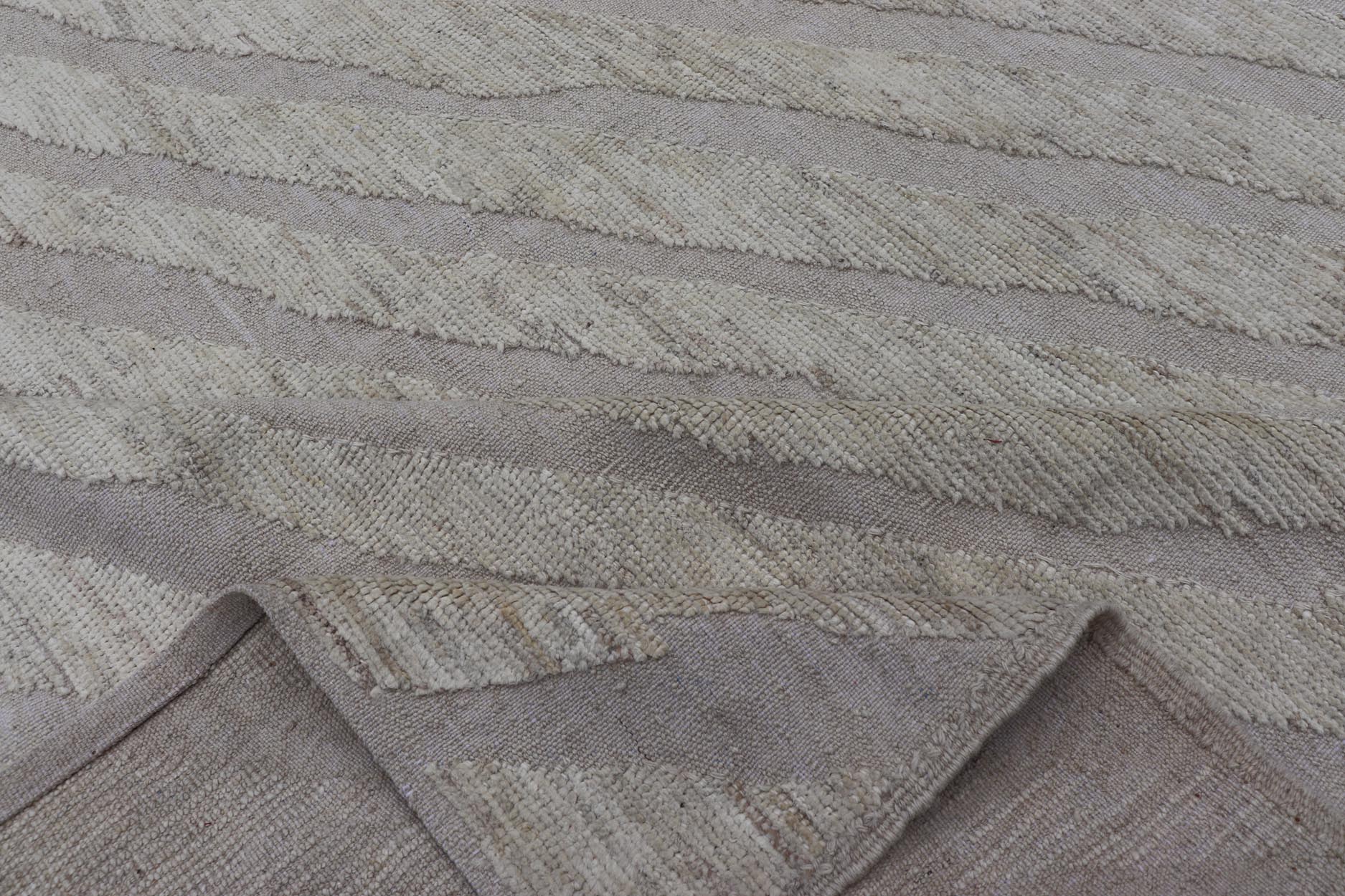 Modern Rug in Wool with Sub - Geometric Slanted Linear Design in Cream and Taupe This modern casual tribal rug has been hand - knotted in wool. The rug features a modern sub - geometric slanted linear design, rendered in creams tones; making this rug ... - Keivan Woven ArtsAFG - 41009 - 19808Rug