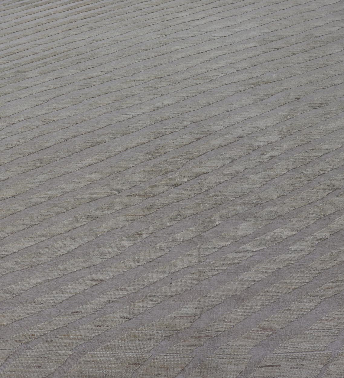 Modern Rug in Wool with Sub - Geometric Slanted Linear Design in Cream and Taupe This modern casual tribal rug has been hand - knotted in wool. The rug features a modern sub - geometric slanted linear design, rendered in creams tones; making this rug ... - Keivan Woven ArtsAFG - 41009 - 19808Rug