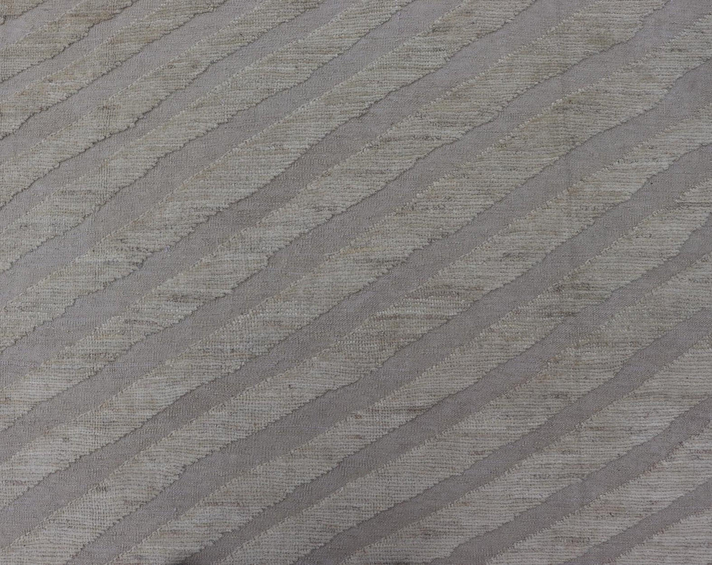 Modern Rug in Wool with Sub - Geometric Slanted Linear Design in Cream and Taupe This modern casual tribal rug has been hand - knotted in wool. The rug features a modern sub - geometric slanted linear design, rendered in creams tones; making this rug ... - Keivan Woven ArtsAFG - 41009 - 19808Rug