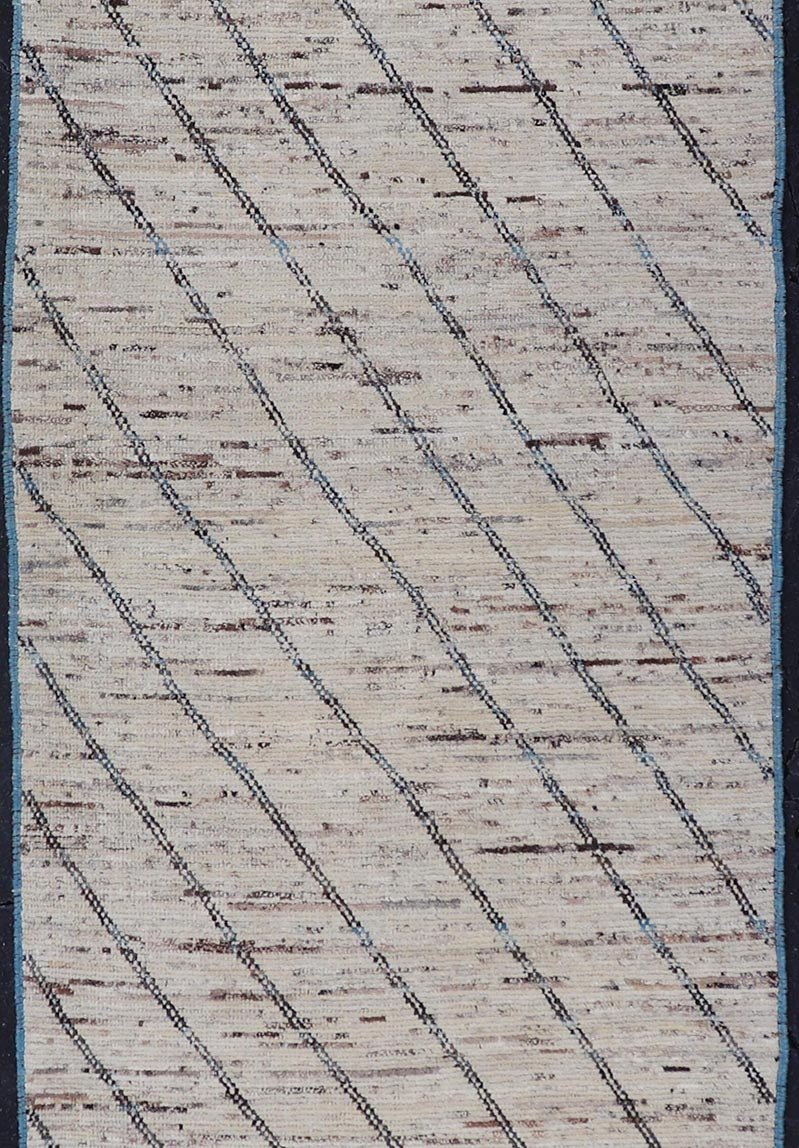 Modern Hand - Knotted Runner in Wool with Slanted Linear Design in Earthy Tones This modern casual tribal rug has been hand - knotted. The rug features a modern linear design, rendered in earthy tones and blues, making this rug a superb fit for a va... - Keivan Woven ArtsAFG - 41031 - 19466Rug